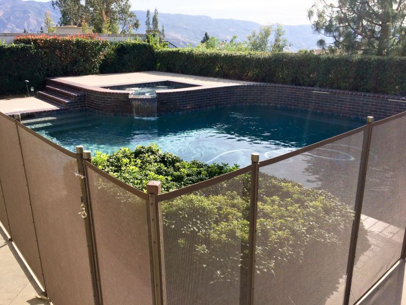 Pool Area with Mesh Fence